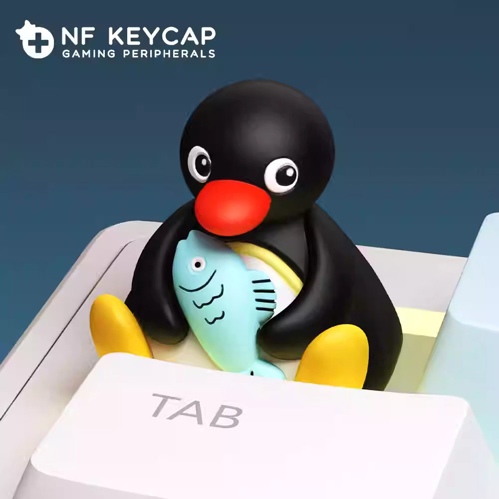 Penguin holding Fish Artisan Key Cap