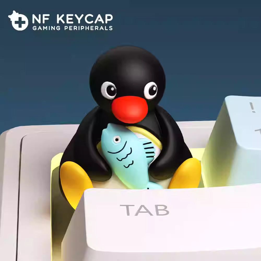 Penguin holding Fish Artisan Key Cap