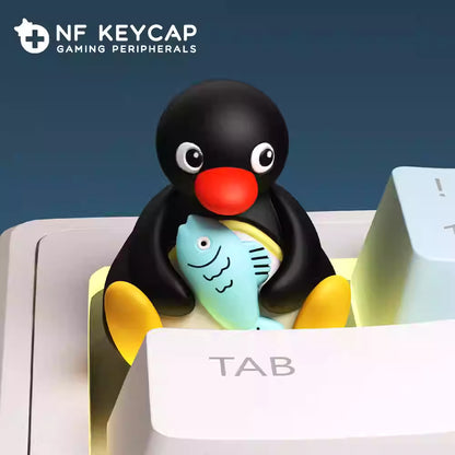 Penguin holding Fish Artisan Key Cap