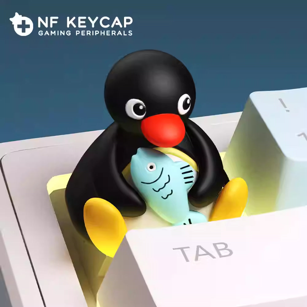 Penguin holding Fish Artisan Key Cap
