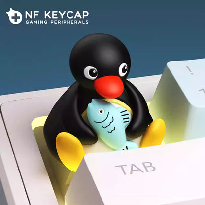 Penguin holding Fish Artisan Key Cap